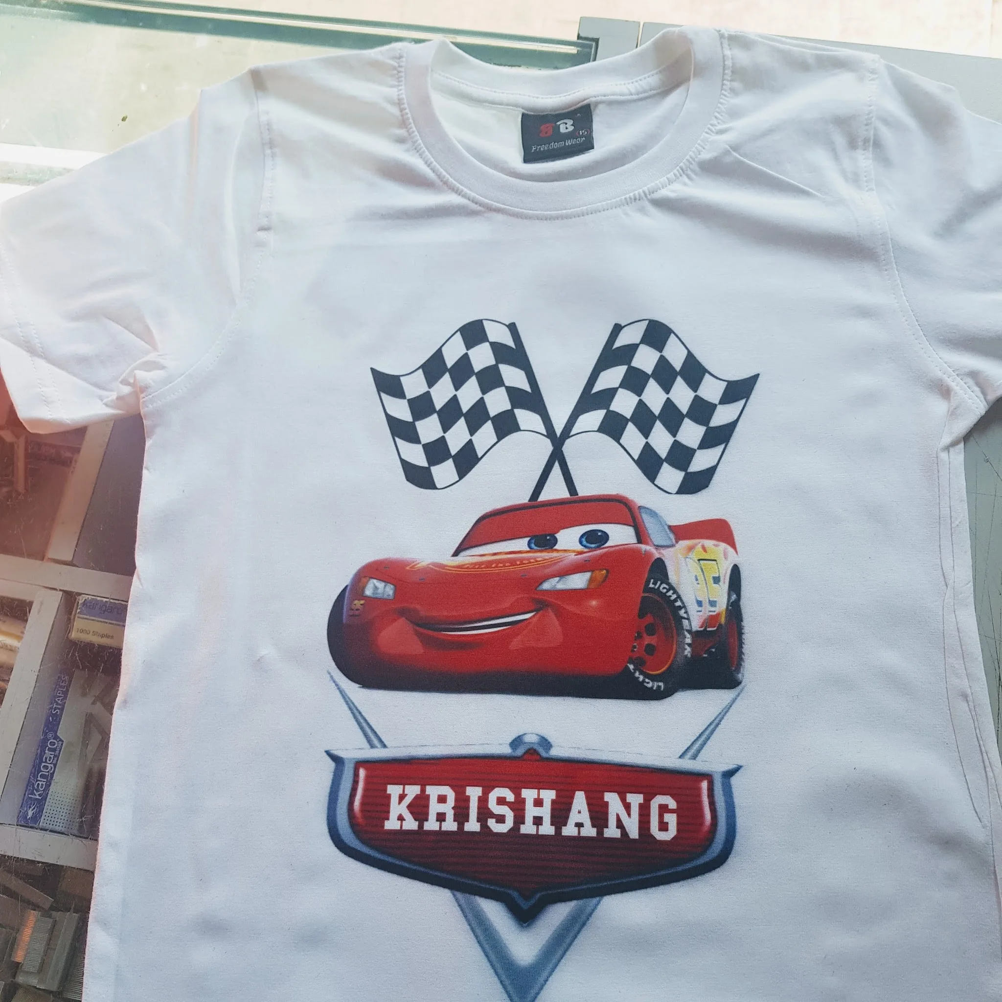 Vibrant DTF print on white t-shirt — print quality varies with PET film 60 micron vs 75 micron