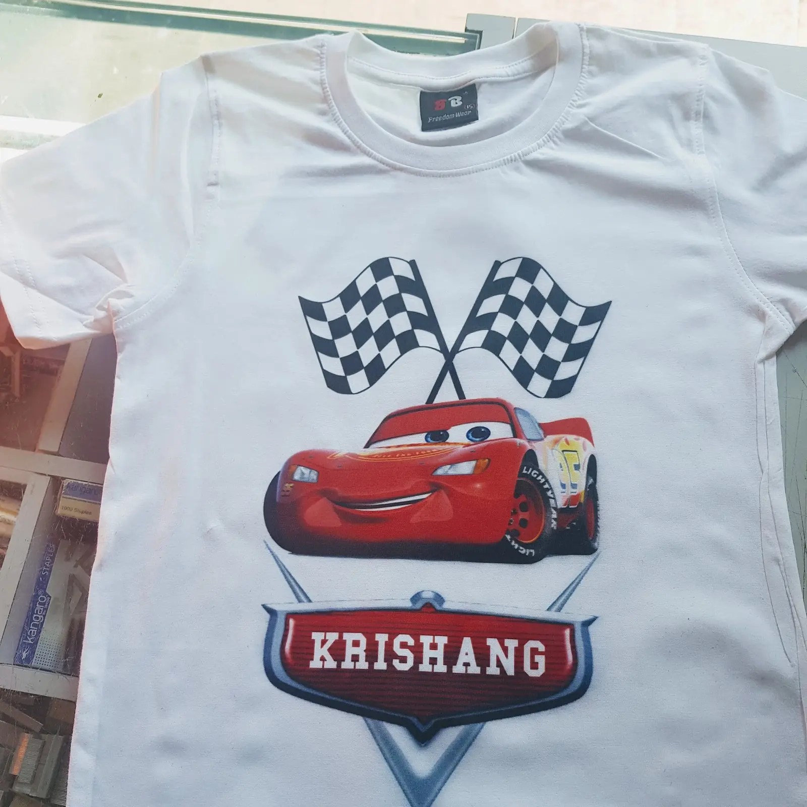 Vibrant DTF print on white t-shirt — print quality varies with PET film 60 micron vs 75 micron